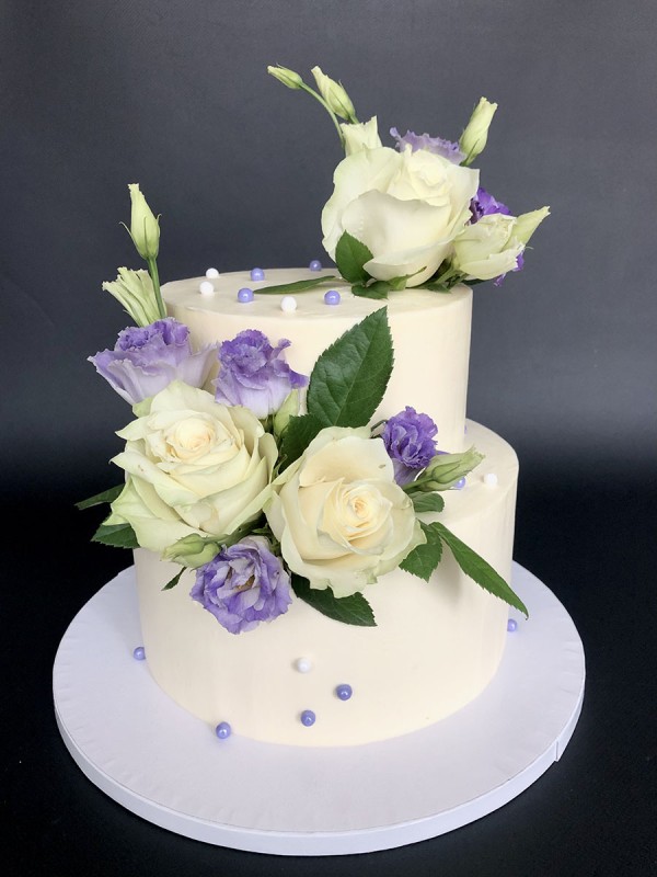 Lilac themed white wedding cake