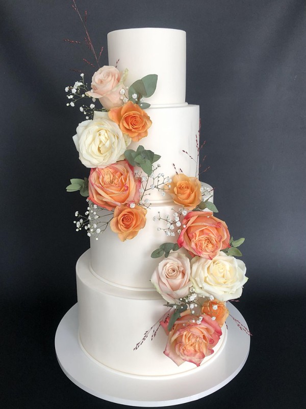 Orange and white fondant wedding cake